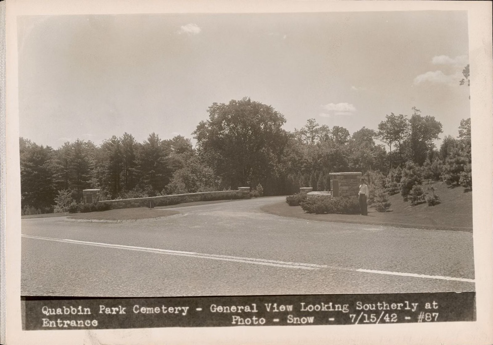 Black-and-white 1942 view of the entrance to Quabbin Park Cemetery and its landscaped grounds