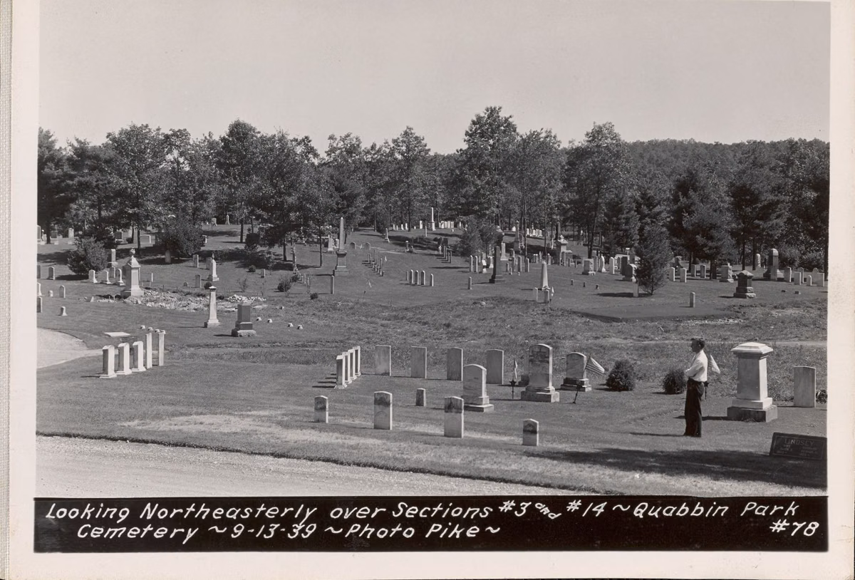 Black-and-white 1939 photo of rows of reburied gravestones in Quabbin Park Cemetery